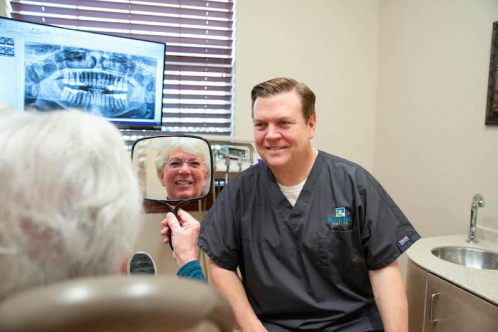 Smiling patient with Dr. Robinson